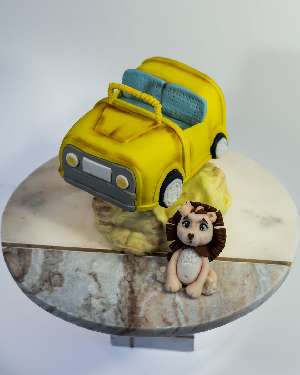 Yellow car and lion