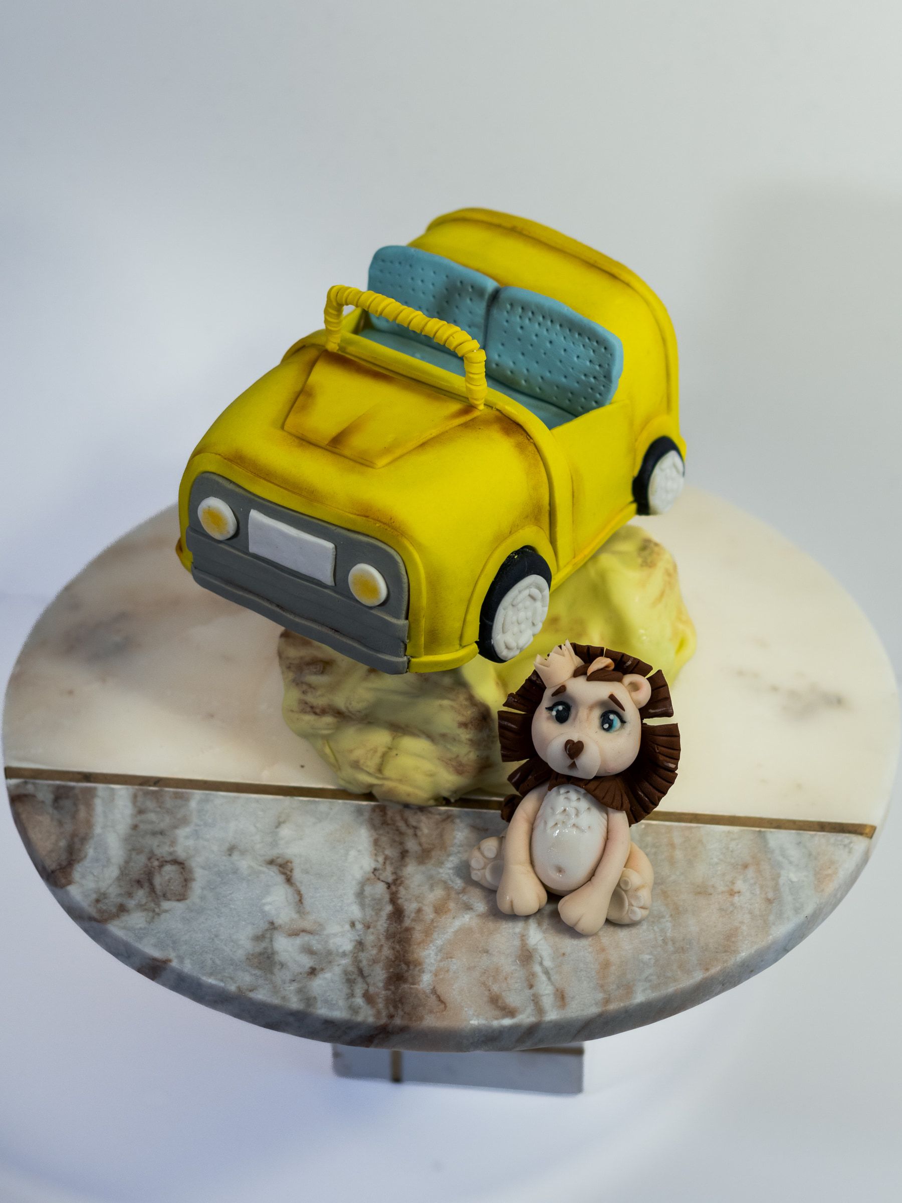 Yellow car and lion