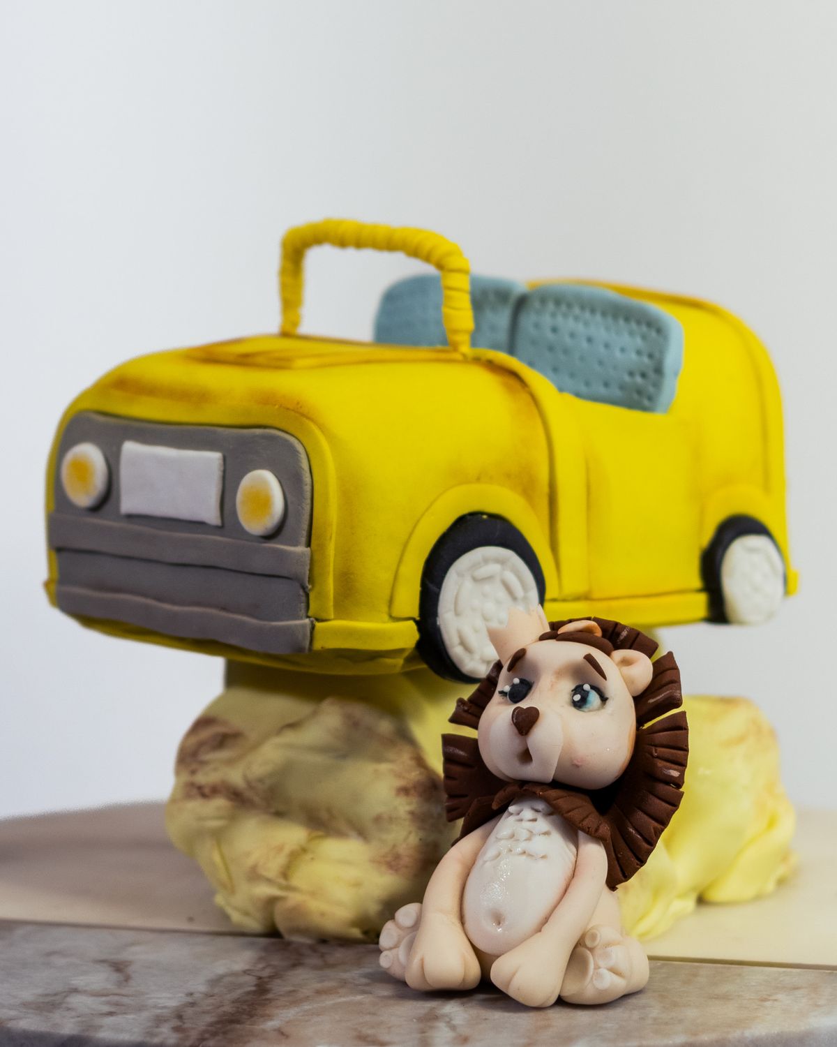 Yellow car and lion