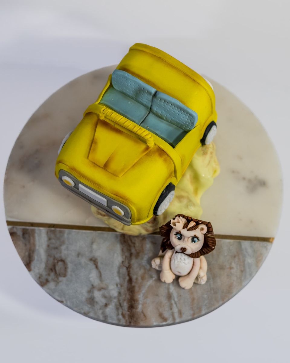 Yellow car and lion
